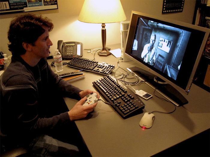 Todd Howard, the game director for Bethesda Softworks, plays Fallout 3 in his office. He says the casual culture is one of the attractions of a career in the video game industry.