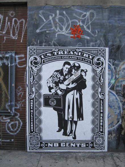 Shepard Fairey’s poster “No Cents,” stands against a backdrop of graffiti in New York City. ©Joshua Brockman 2008. All Rights Reserved.