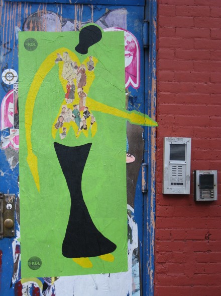 A vibrant collage adorns an exterior door in New York City. ©Joshua Brockman 2008. All Rights Reserved.