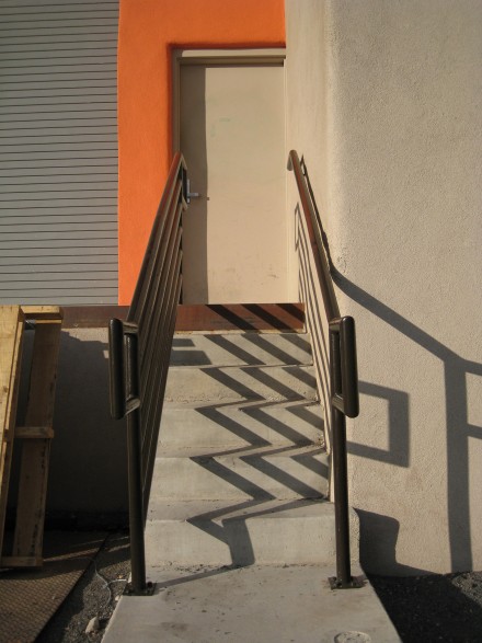 Shadows lead the way to an orange doorway at dusk in Santa Fe, New Mexico. ©Joshua Brockman 2012. All Rights Reserved.