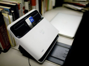 A digital scanner like one from NeatDesk 